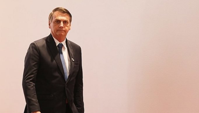 Brazil President Jair Bolsonaro arrives for the family photo at the G20 Osaka Summit in Osaka Prefecture on June 28, 2019. (Photo by ludovic MARIN / AFP)