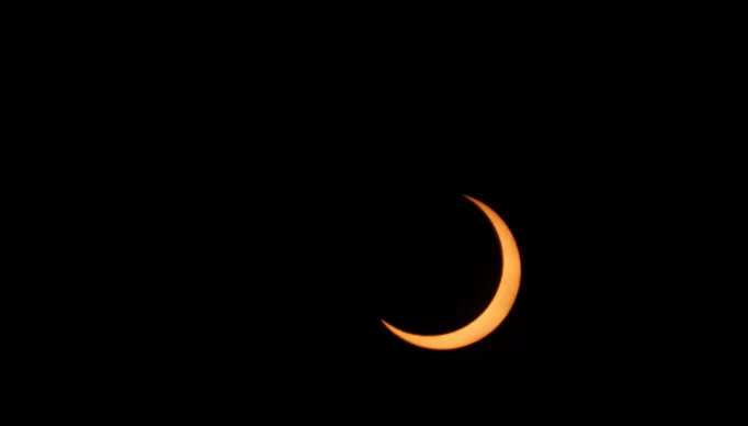 A solar eclipse is seen from the Bicentenario Park in Antiguo Cuscatlan, El Salvador October 14, 2023. REUTERS/Jose Cabezas