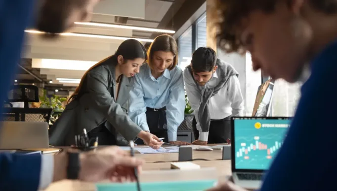 people-analyzing-checking-finance-graphs-office