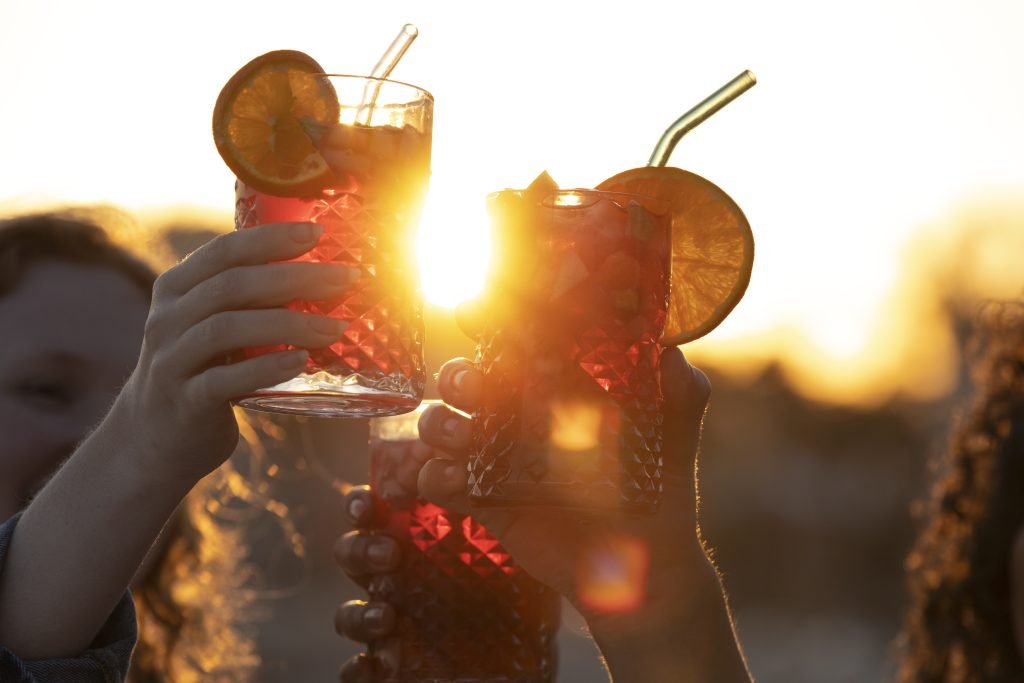 side-view-friends-holding-sangria-drinks-1024x683